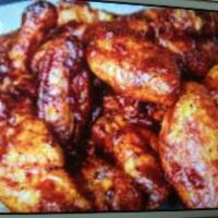 A2. Chicken Wings with Garlic Sauce · Hot and spicy. 
