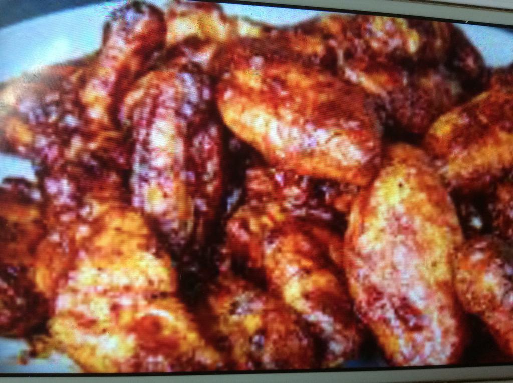 A2. Chicken Wings with Garlic Sauce · Hot and spicy. 