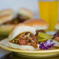 Pulled Pork Sliders · 3 smoked pork sliders, served with opal’s wicked sauce, caramelized onions, and pickles.