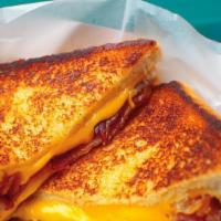 9. Grilled Cheese with Bacon Breakfast Sandwich · Hot sandwich filled with cheese that has been pan cooked or grilled. 