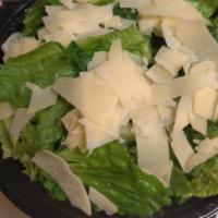 Caesar Salad · Tossed romaine lettuce, croutons, Parmesan cheese and Caesar dressing.