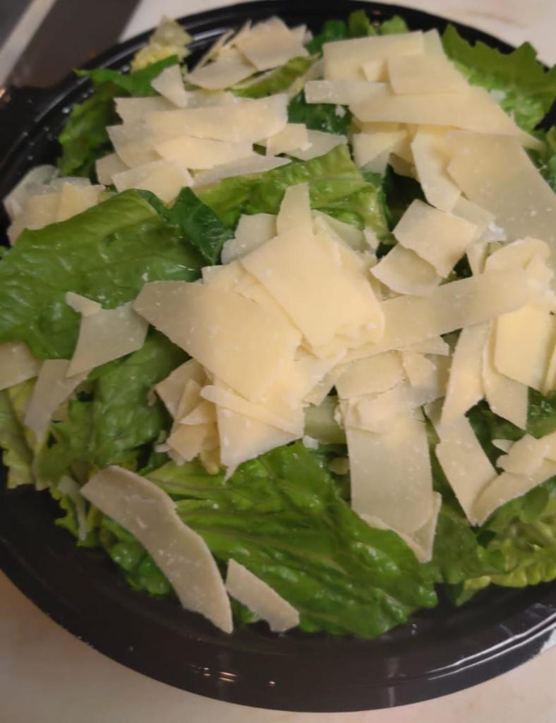 Caesar Salad · Tossed romaine lettuce, croutons, Parmesan cheese and Caesar dressing.