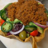 Taco Salad · Lettuce, cucumbers, cherry tomatoes, black olives, avocado, jalapeno and red onions with you...