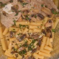 Veal Piccante  · Sauteed veal medallions with mushroom, lemon, butter, capers and white wine.