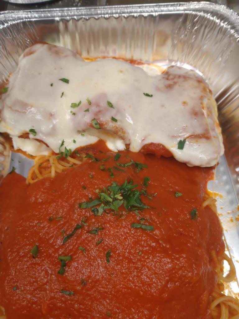 Eggplant Rollatini · Eggplant stuffed with ricotta cheese, sauce, topped with mozzarella and your choice of pasta.