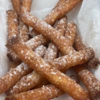 Funnel Cake Fries · Topped with powdered sugar & with your choice of strawberry, chocolate, or caramel sauce.