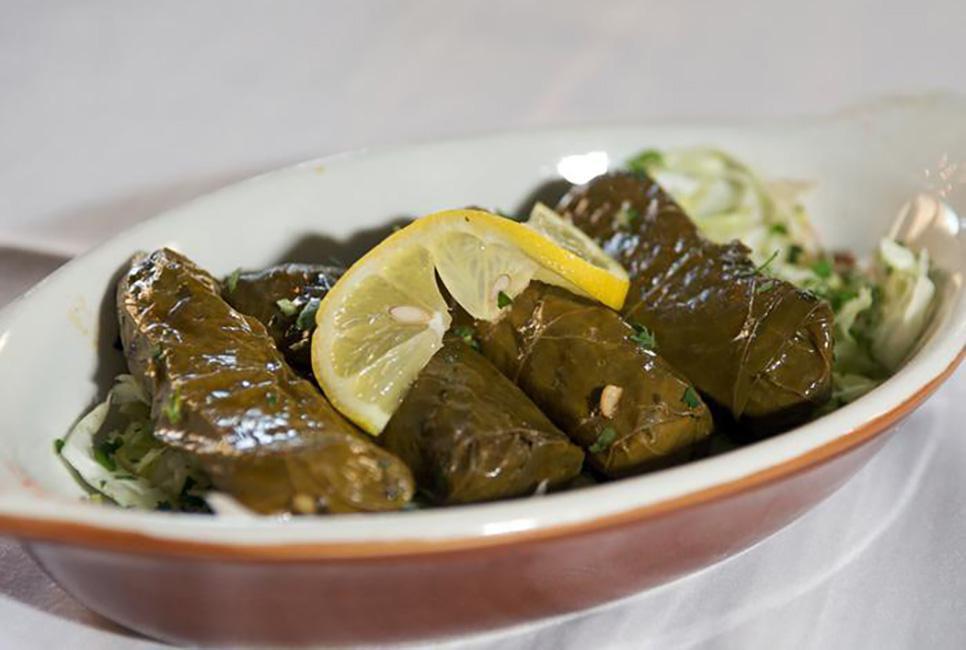 Wara'anib B'ziat · Grape leaves stuffed with vegetables. Served cold. 
