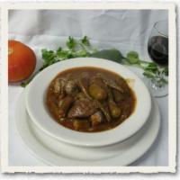 Bamia · Fresh okra cooked with lamb chunks in a tomato sauce made with pomegranate nectar. Served wi...