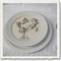 Yachneh B'leban · Stew of lamb chunks cooked in yogurt. Served with rice. 