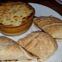 Crock of Chili · Topped with cheddar cheese. Served with roll and butter.