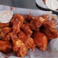 Storm Warn Wings · served with celery, carrots, and homemade Hurricane bleu cheese