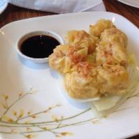 Steamed Dumpling · Large. Ground pork and shrimp with water chestnut.