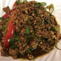 Pad Kaprow · Large. Sauteed with fresh basil and garlic chili sauce. Served with white rice.