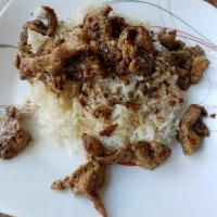 Pad Garlic · Large. Sauteed meat with garlic and black pepper on rice.