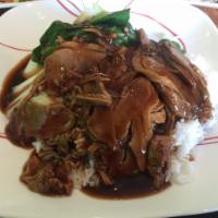 Kaw Na Ped · Large. Soy sauce duck on rice.