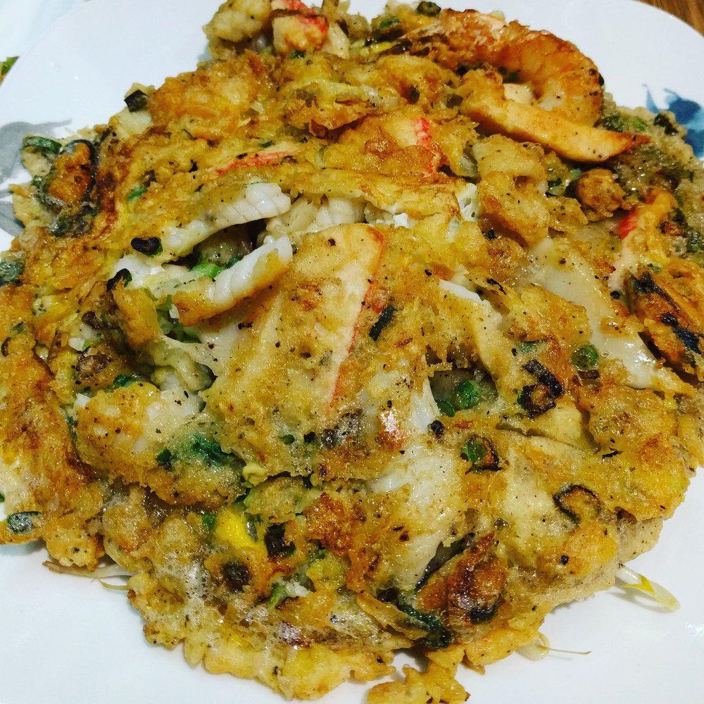 Seafood Pancake · Thai style pancake with fresh shrimp, crabmeat, squid and mussels served with sautéed bean sprouts.
