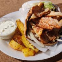 Chicken Gyro Souvlaki Wrap  · Chicken Gyro wrapped in pita bread, with tzatziki sauce, lettuce, tomato onions and roasted ...