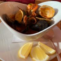 Sopa de Mariscos Dinner · (16oz) mussels, clams, squid, scallops, shrimp, potatoes, carrots onions, cilantro and lemon...