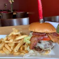 Izzy's Burger Dinner · Two 6 oz. patties, grilled onions, American and cheddar cheese bacon, lettuce and tomatoes, ...