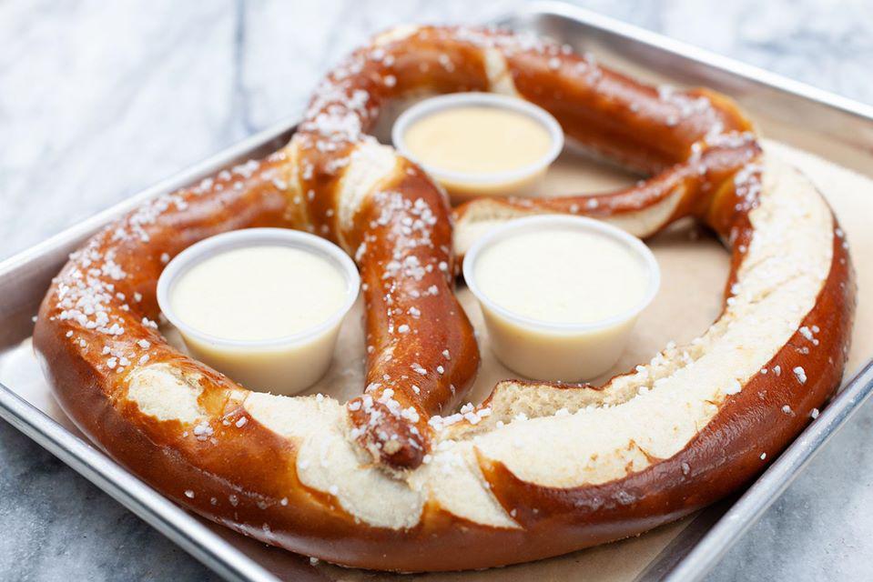 Bavarian Pretzel · Served with house made cheese sauce and spicy Dijon mustard.