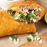 Burrito · Burrito filled with beef birria, rice, beans, cheese, guacamole, onions, and cilantro.