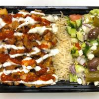 2. Chicken over Regular Rice · Chopped grilled chicken over seasoned regular rice, side of salad ( Lettuce, Onions,  tomato...