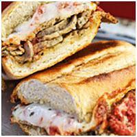 Meatball Sandwich · Sliced meatball and homemade red sauce with smoked provolone, Parmesan and Romano cheese. Se...