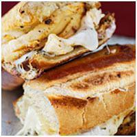 Buffalo Chicken Sandwich · Grilled chicken breast with spicy wing sauce, homemade ranch and smoked provolone cheese. Se...