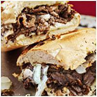 Philly Cheesesteak Sandwich · Seasoned grilled steak, onions and mushroom with white American cheese and smoked provolone ...