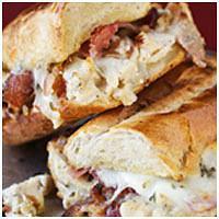 Cordon Bleu Sandwich · Grilled chicken breast, smoked ham, bacon and Alfredo sauce with white American cheese. Serv...