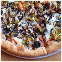 Classic Veggie Pizza · Black olives, onion, mushroom, green pepper, banana pepper rings and fresh tomato with mozza...