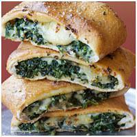 Garlic Spinach Stromboli · Garlic spinach with mozzarella and white american cheese, folded in our hand-tossed original...