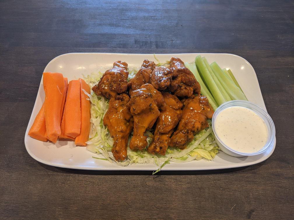 Whole Wings by The Pound · Served Naked or tossed. Choose Dipping Sauce.