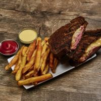 Classic NY Style Rueben · In-house cooked corned beef piled high with Swiss cheese,
Sauerkraut and 1000 island dressin...