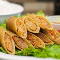 4 Piece Pork Lumpia · Deep fried ground pork mixed with spices and and vegetable wrapped in rice paper. 
