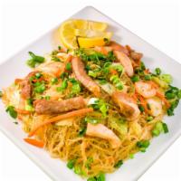 Pancit Bihon · Stir-fried cornstarch noodles with veggies: celery, carrots and cabbage. Add your choice of ...