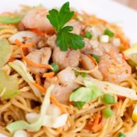 Pancit Canton · Stir-fried wheat flour noodles with veggies: celery, carrots and cabbage. Add your choice of...