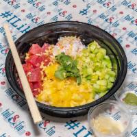 Pineapple Express · Ahi Tuna|Surimi Crab|Pineapple|Cilantro|Cucumber|Tempura Flakes|Yuzu Miso Sauce