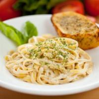 Chicken Fettuccine Alfredo Pasta · Fontina cream, lots of Parmesan, and cracked pepper. All pasta made fresh at pasta delights.