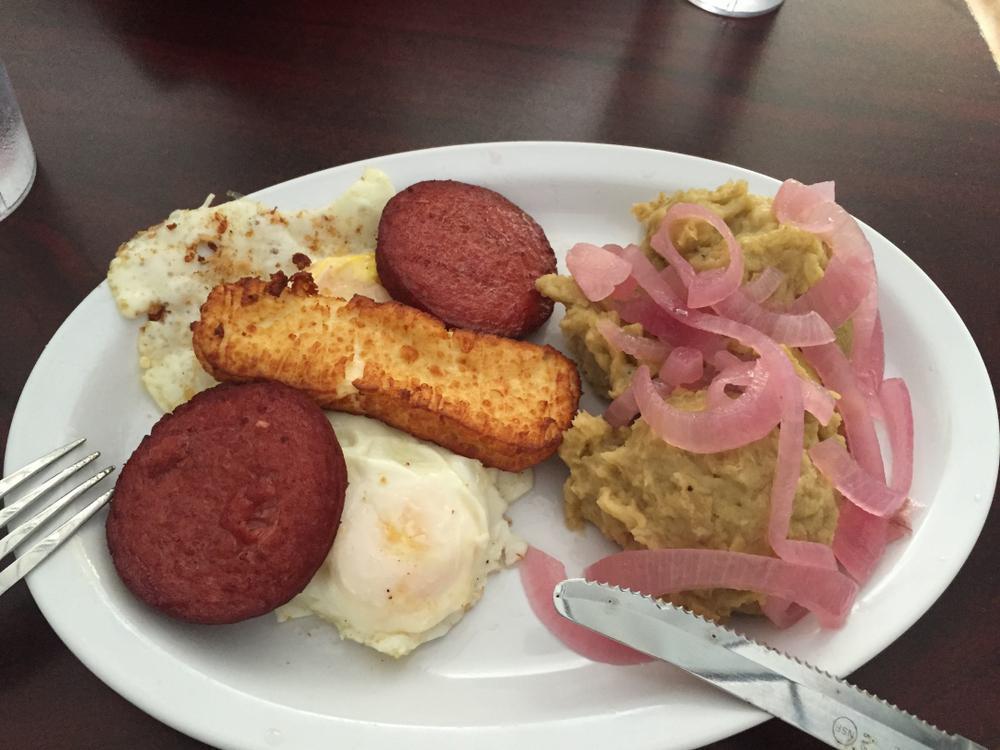 Dominican Breakfast Platter · Mangu (mushed Green Plantain), salami, eggs, fried cheese 