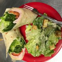 The Dragon Wrap · Turkey, provolone, tomatoes, cucumber, spinach, romaine and our blend of basil-infused extra...