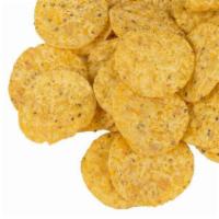 Basket of Chips · Delicious yellow corn tortilla chips.