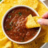 Chips with Fresh Homemade Salsa · Our delicious yellow corn tortilla chips with a side of our fresh, house-made salsa.