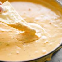 Chips with Unbelievable Queso · Our delicious yellow corn tortilla chips made with our very own secret recipe queso.  It's u...