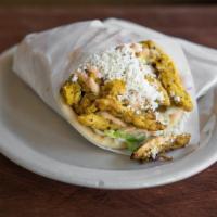 Blazin' Chicken Gyro · Grilled chicken gyro served on a pita bread with pickles, lettuce, tomatoes and onions toppe...