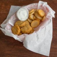 Chicken Nuggets Basket · Chicken nuggets with a small side of fries.
