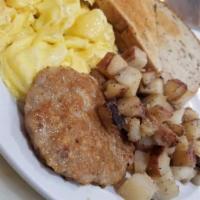 Breakfast Plate · 2 eggs with sausage, bacon,  potato and toast.