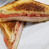 Grilled Melt Combo · Tuna, turkey or ham toasted with tomato and your choice of American, provolone or Swiss chee...