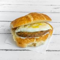 Croissants Sausage Eggs Cheese · Served on a flaky French pastry.