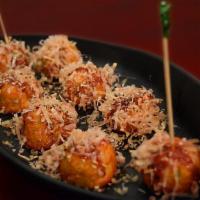 8 Piece Takoyaki · Fried balls of octopus in savory Japanese pancake batter.